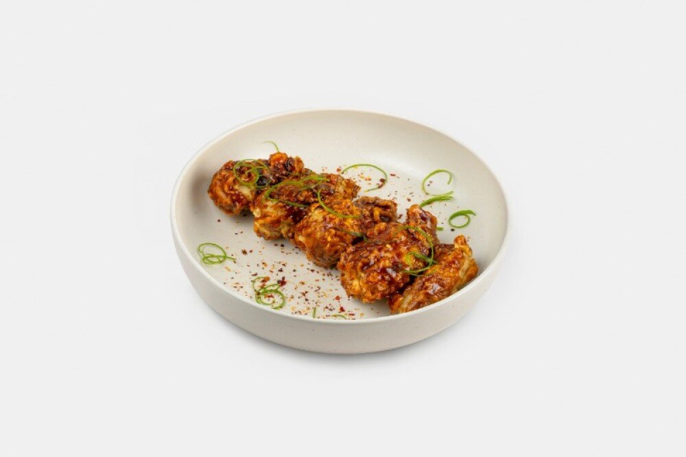 Куриные крылышки в соусе из черного перца