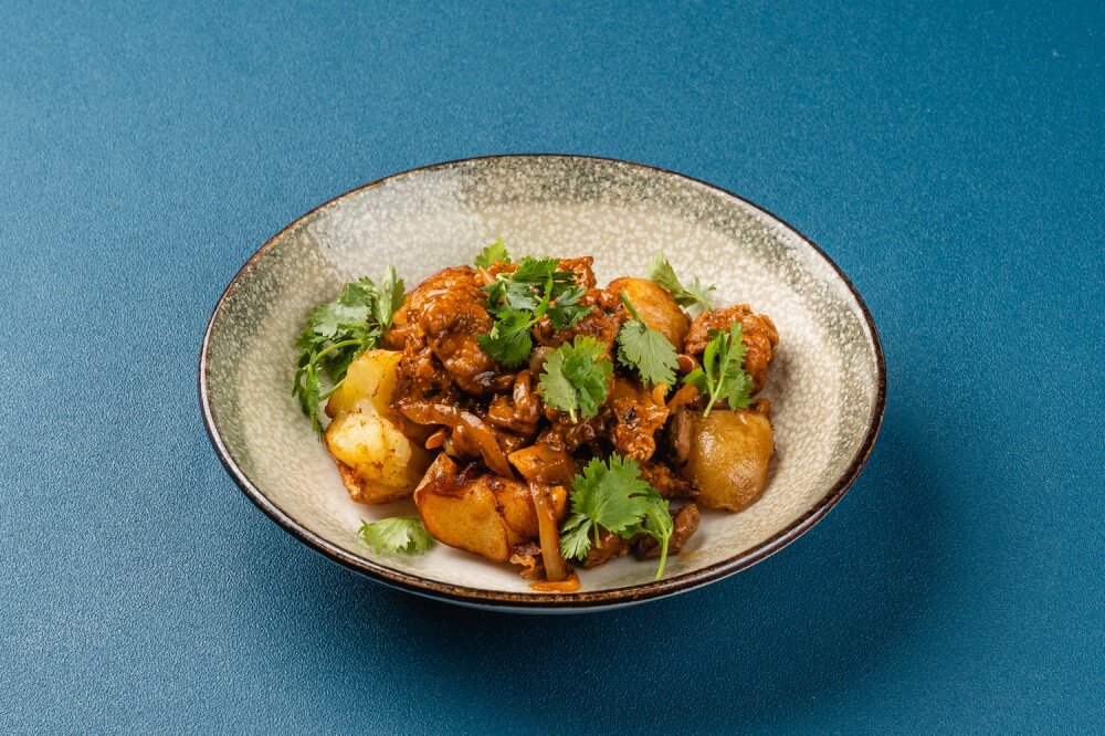 Куриные потрошка в аджике