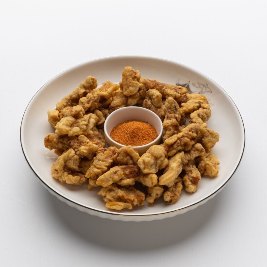 Пряные ломтики свинины в крахмале