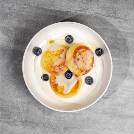 Сырники со сгущёным молоком и голубикой