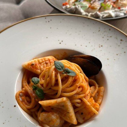 Паста с морепродуктами в соусе том ям