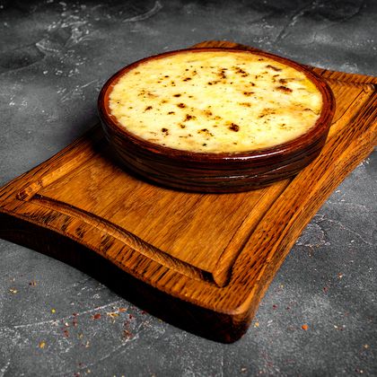 Свинина с овощами под сыром