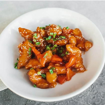 Жареное свиное филе в кисло-сладком соусе