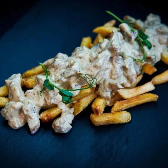 Мясо Рапана в сливочном соусе с картошкой фри 250гр