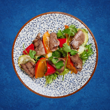 Теплый салат с языком и гранатовой заправкой